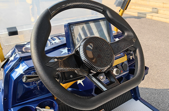 https://www.bak-ev.com/wp-content/uploads/2025/01/Patriots-Golf-Cart-Detail-View-Steering-wheel-2.jpg